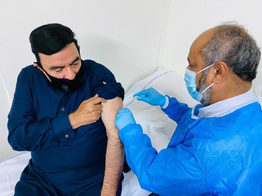 Sheikh Rashid Ahmed receives COVID-19 vaccine