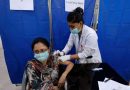 A-woman-receives-the-first-dose-of-the-coronavirus-disease--COVID-19--vaccine--as-the-government-started-vaccination-for-the-general-public--starting-with-elderly-people--at-a-vaccination-center-in-Kar