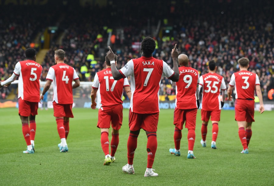 Arsenal survive Watford scare to move into top four