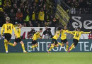 Dortmund beat Mainz to keep title hopes alive