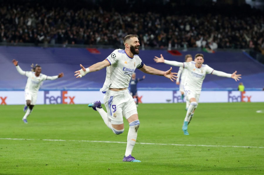 Benzema leads Madrid past PSG