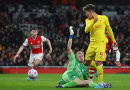 Liverpool overcome Arsenal to close gap on Man City