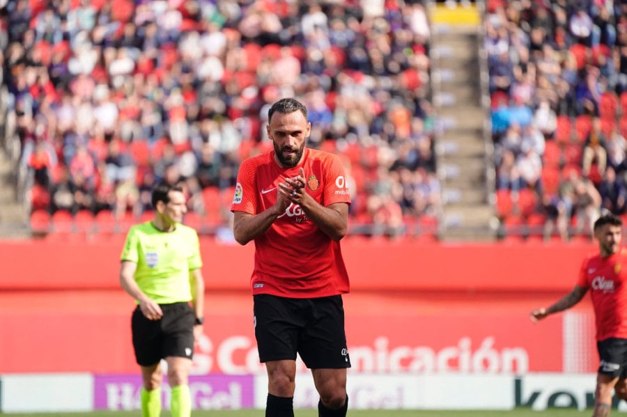 Mallorca end Atletico's winning run in La Liga