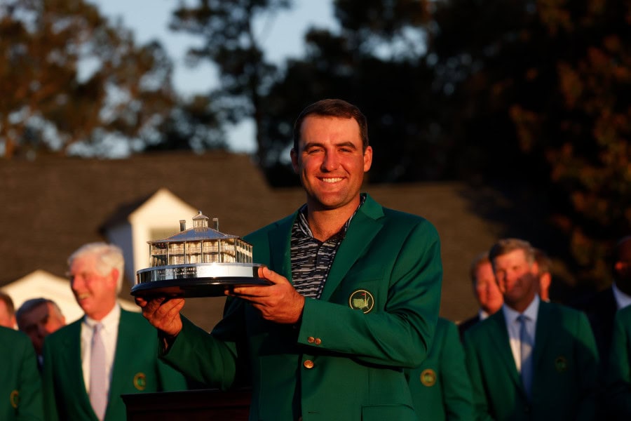 Scottie Scheffler outlasts McIlroy to win The Masters