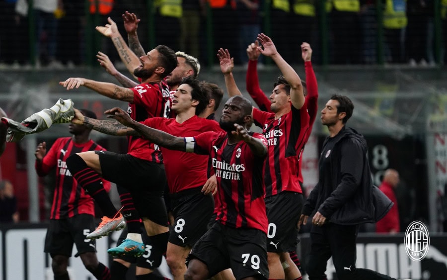 Milan beat Genoa to maintain Serie A lead