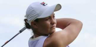 Ash Barty swaps racket for golf clubs