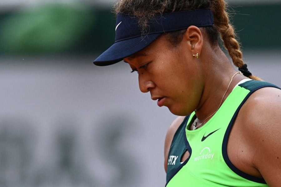 Osaka ousted, Swiatek glides through at French Open