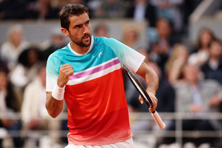 Marin Cilic celebrates after a point