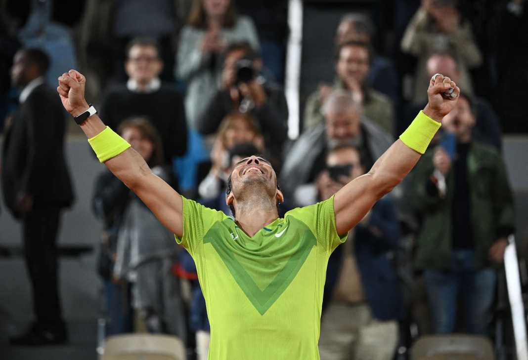 Nadal celebrates after beating Djokovic