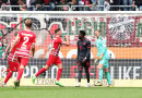 Bundesliga: Bayern slump to defeat against Augsburg, Dortmund goes top