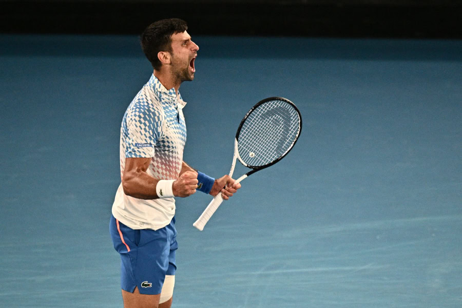 Novak Djokovic celebrates a point against Andrey Rublev in the Australian Open