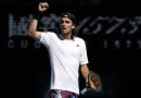 Stenafos Tsitsipas celebrates after setting up and Australian Open final against Novak Djokovic