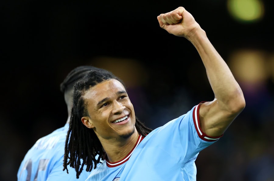 Natahan Ake celebrates scoring for Manchester City against Arsenal in the FA Cup