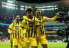 Dortmund players celebrate after scoring against Bayer Leverkusen