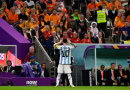 Lionel Messi celebrates his goal against the Dutch