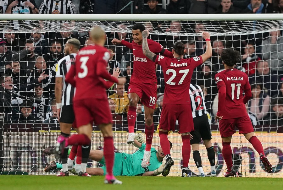 Liverpool celebrate scoring against Newcastle United