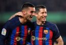 Barcelona players celebrate against Cadiz