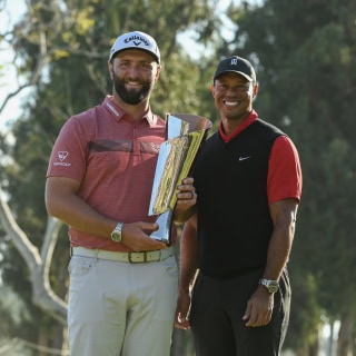 Jon Rahm celebrates with Genesis Open trophy