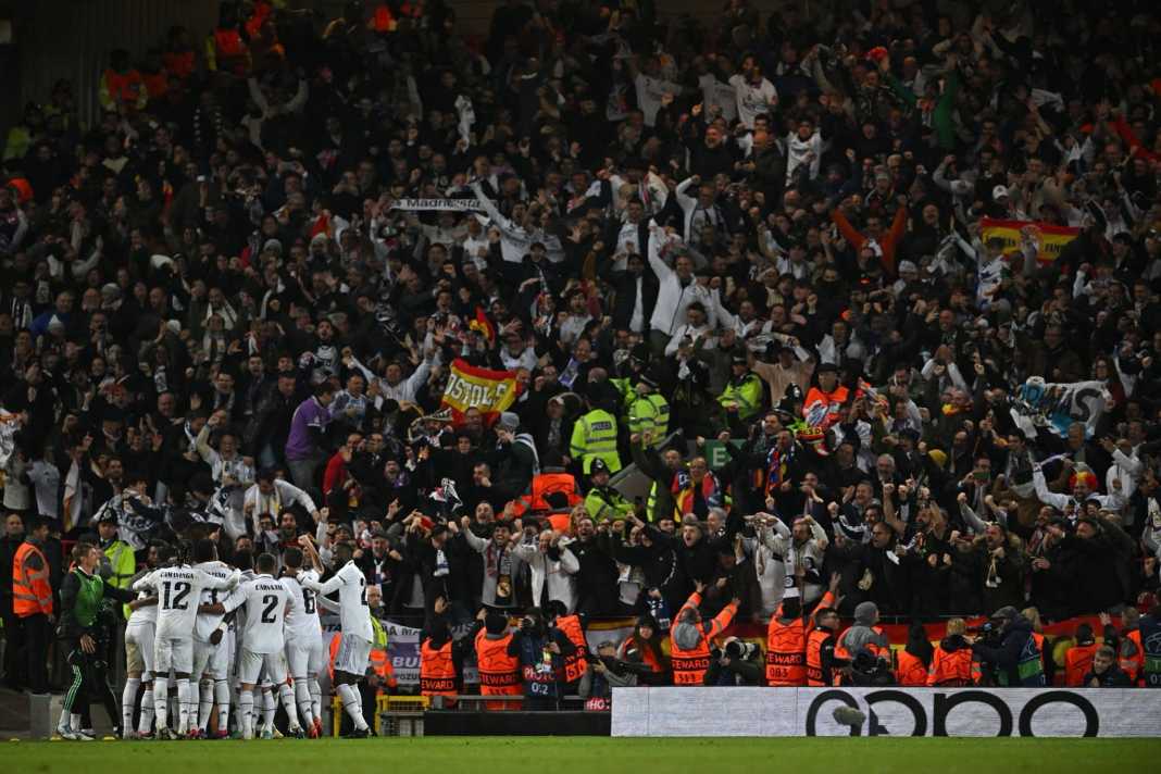 Real Madrid celebrate a goal against Liverpool