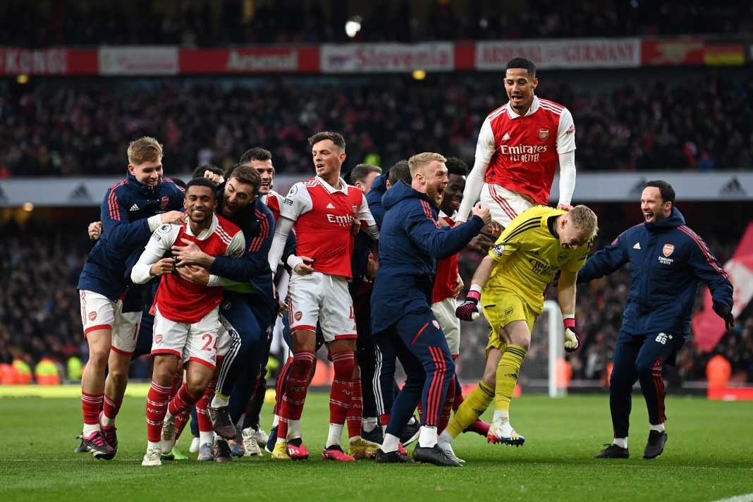 Arsenal celebrate beating Bournemouth