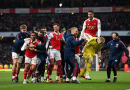 Arsenal celebrate beating Bournemouth