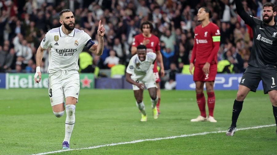 Benzema celebrates scoring for Real Madrid against Liverpool in the Champions League