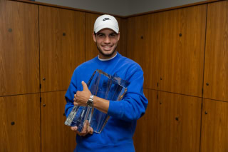 Carlos Alcaraz with his Indian Wells trophy