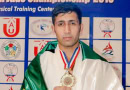 Qaisar Khan shows off his medal