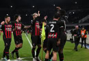 AC Milan celebrates scoring against Napoli