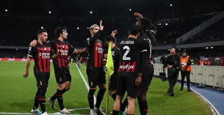 AC Milan celebrates scoring against Napoli