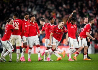 Manchester United celebrate beating Brighton in the FA Cup