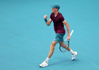 Jannick Sinner celebrates beating Carlos Alcaraz in Miami Open