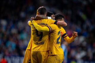 Barcelona celebrate scoring against Espanyol