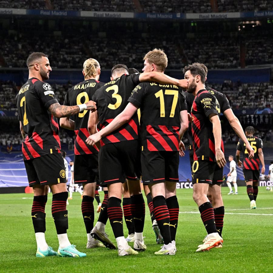 Manchester City celebrate scoring against Real Madrid