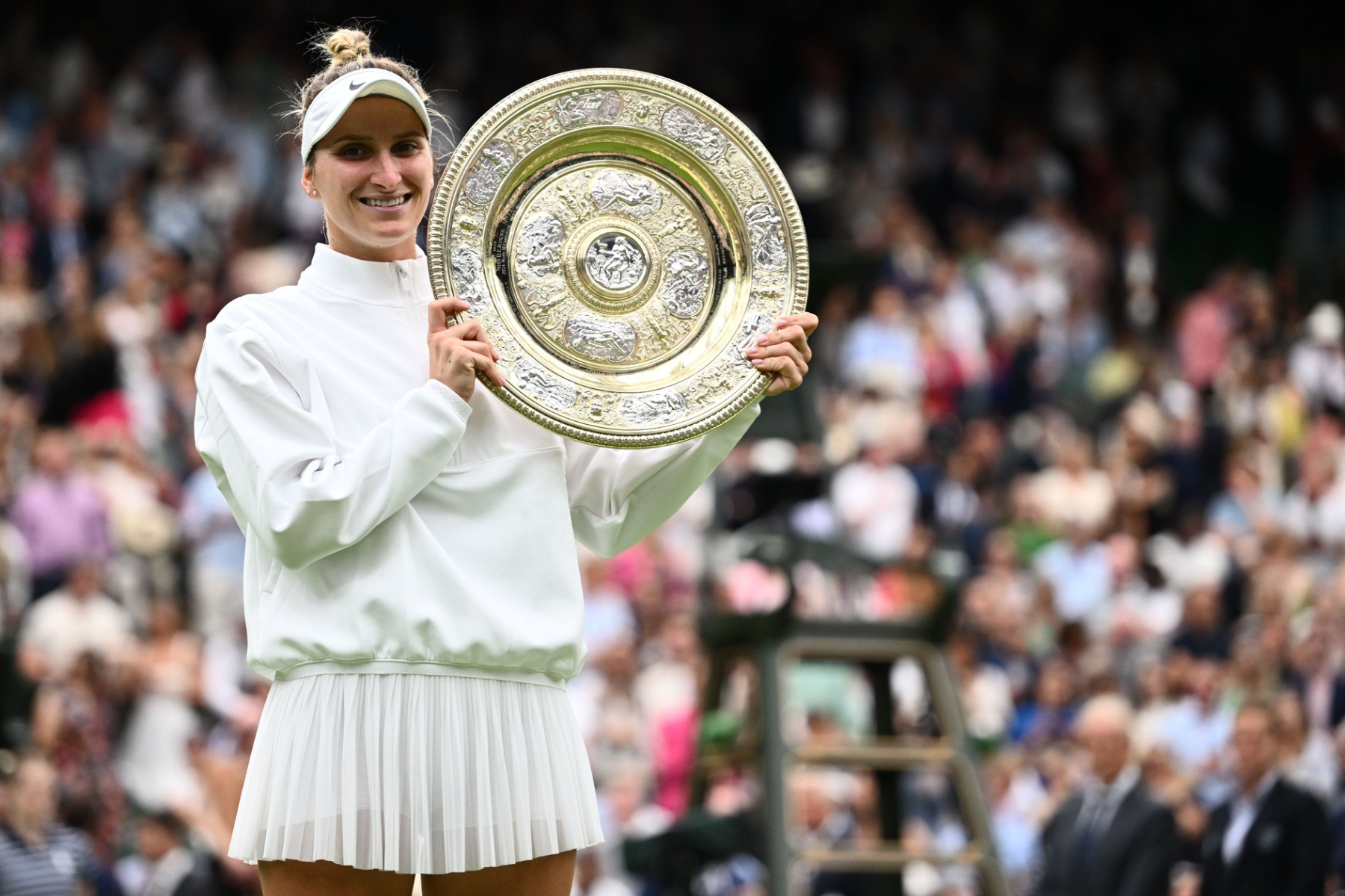 Unseeded Vondrousova stuns tearful Jabeur to win Wimbledon title