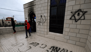 Israeli Settlers Attack Mosque In Gazas Occupied West Bank Set Fire To Entrance