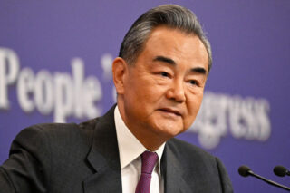 Wang Urges Peace Talks In Phone Call With Iranian Fm