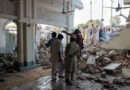 People Gather At A Damaged Mosque Following A Suicide Attack At A Police Facility In Kohat