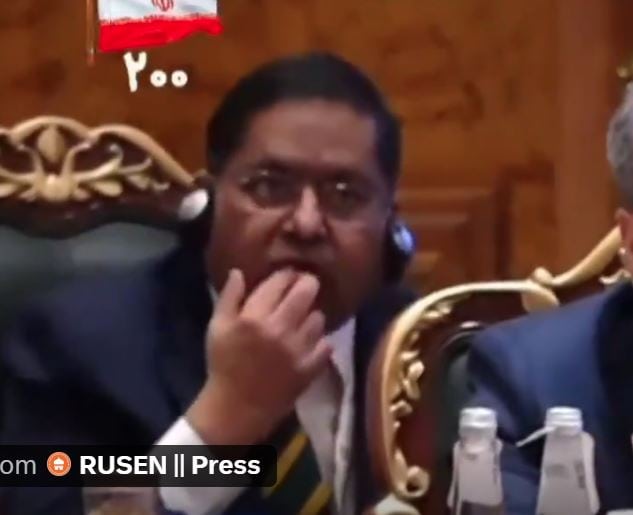Indian Diplomat Jaiswal Caught Munching Nuts Licking Fingers During Iranian Presidents Brics Speech 