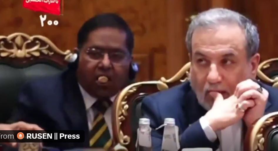 Indian Diplomat Jaiswal Caught Munching Nuts Licking Fingers During Iranian Presidents Brics Speech 