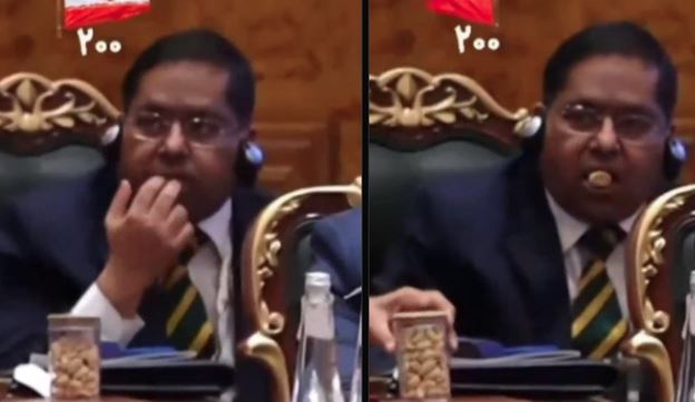 Indian Diplomat Jaiswal Caught Munching Nuts Licking Fingers During Iranian Presidents Brics Speech 