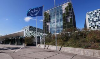 US sanctions International Criminal Court hours after Judge Navi Pillay receives Nobel Peace Prize